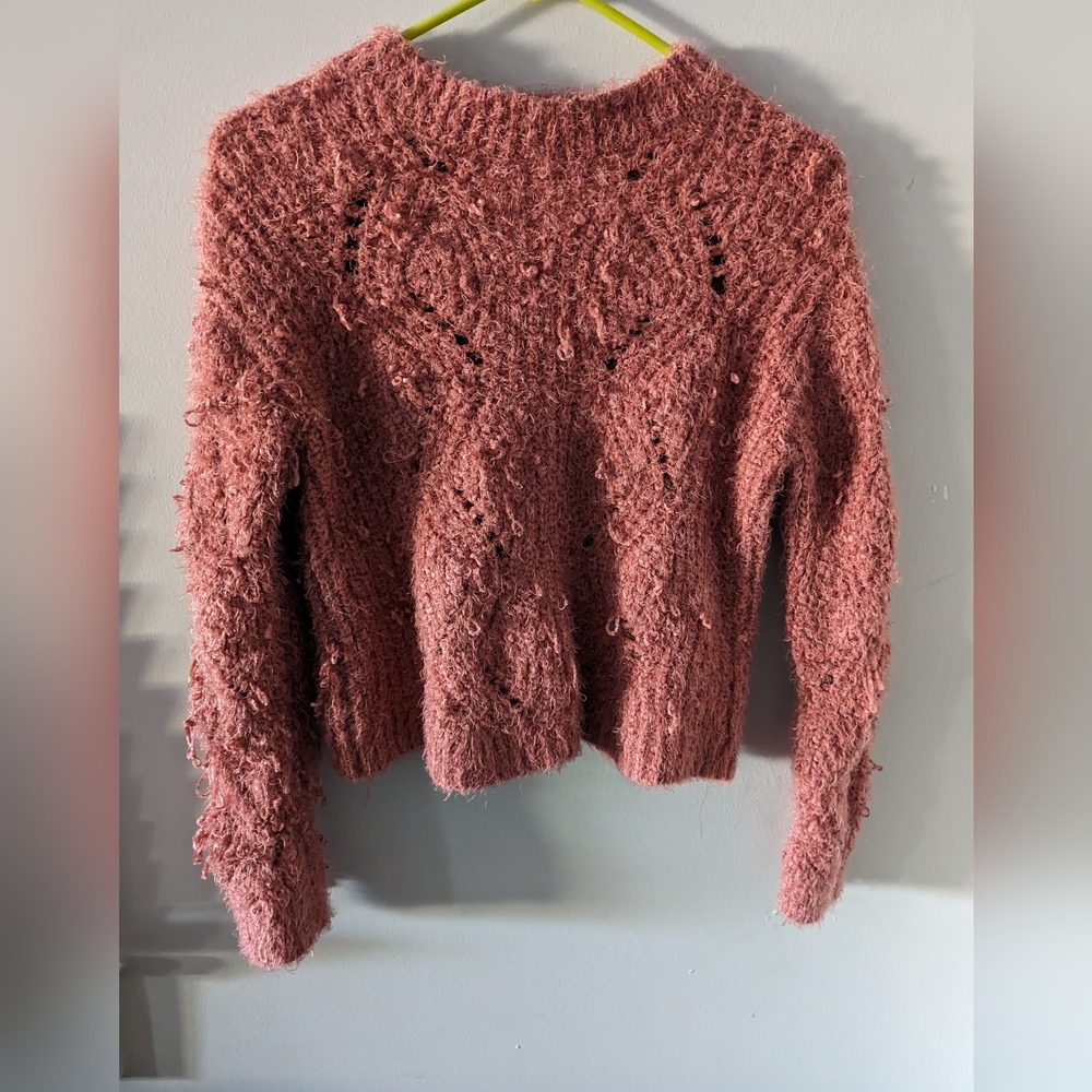 Pink knitted sweater